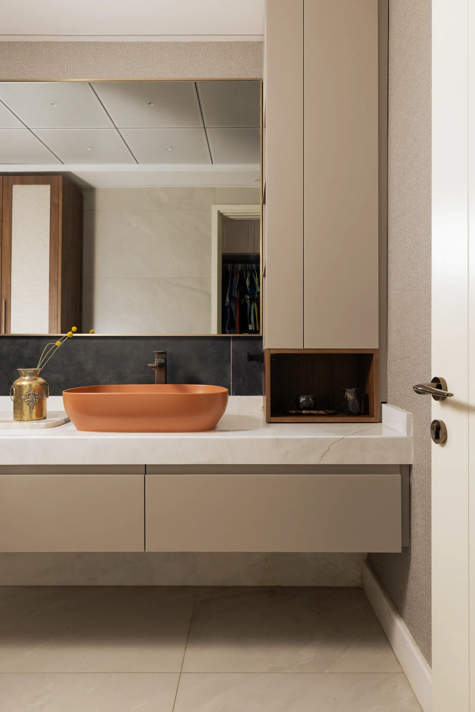 Bathroom vanity with orange vessel basin — Seema Katta Svasa